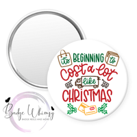 It's Beginning To Cost A Lot Like Christmas - Pin, Magnet or Badge Holder